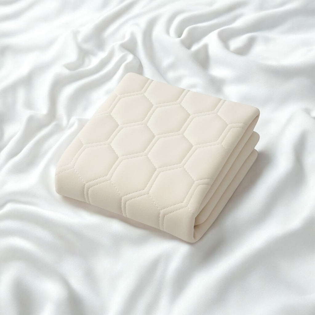 Dream Cream NuVibe Cushion Cover — soft ergonomic replacement cover with premium hex-pattern design on a silky white background.