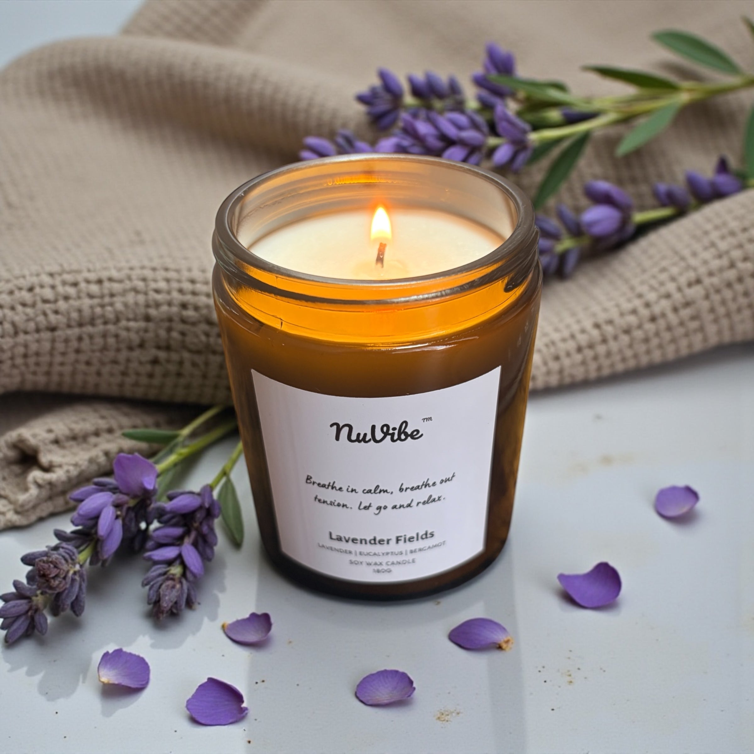 Lavender fields soy wax candle flat lay in amber glass jar, natural home fragrance candle with essential oils for a cosy atmosphere