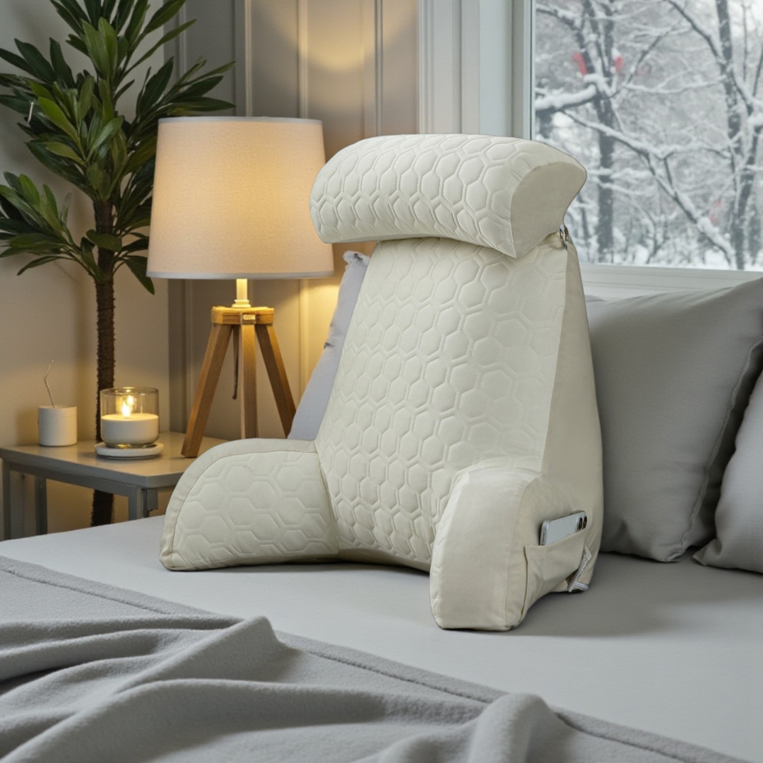 NuVibe™ Ergonomic Comfort Cushion in dream cream designed for supportive comfort and healthy sitting posture, ideal for people seeking everyday back pain comfort while sitting in bed
