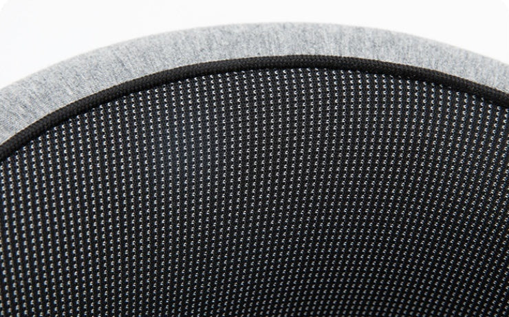 Close-up view of the NuVibe ErgoNest Neck Cushion showing its grey cushioned outer layer and breathable black mesh interior for comfort and durability.